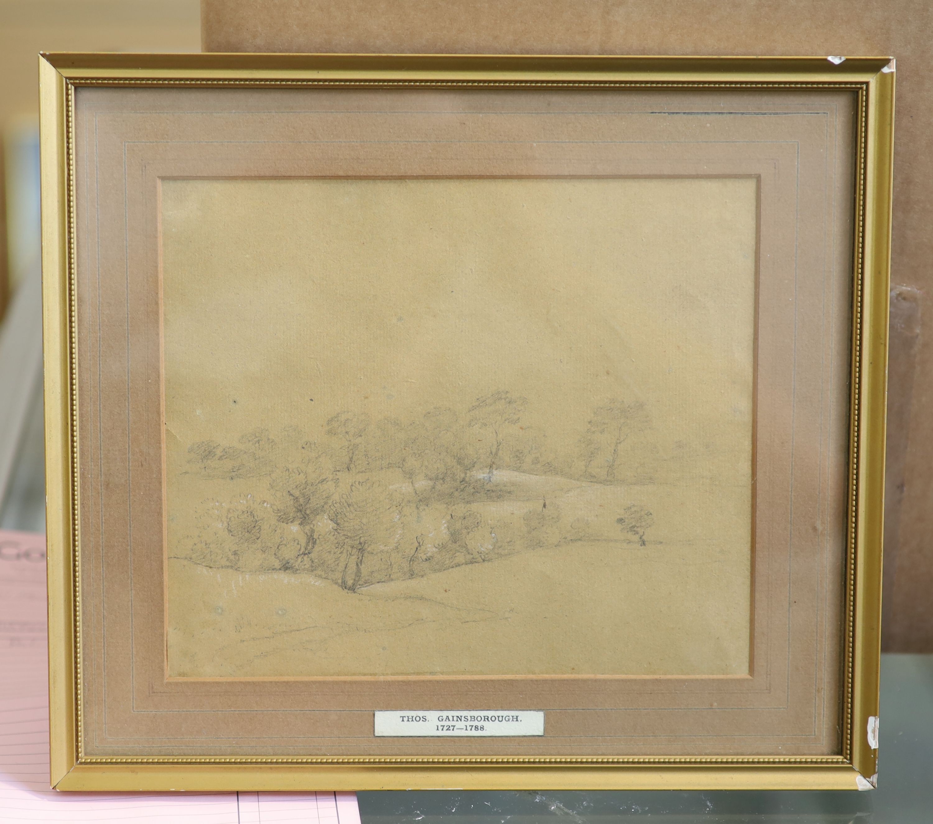 Attributed to Thomas Gainsborough (1727-1788), Trees on a hillside, Pencil and chalk on buff paper, 17.5 x 20.5cm.